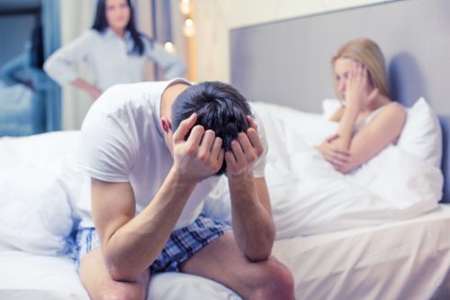 man caught cheating in bed