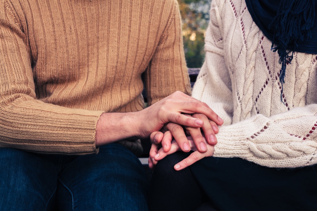 couple holding hands