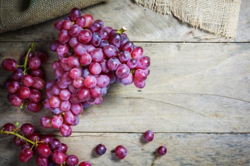 grapes on a wooden table