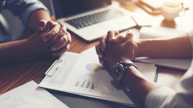 Pair of hands on a desk, Interview, hiring