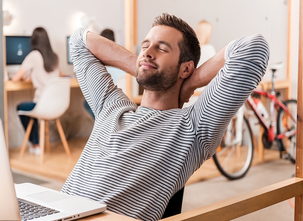 man sitting back and resting in a chair, weight loss motivation