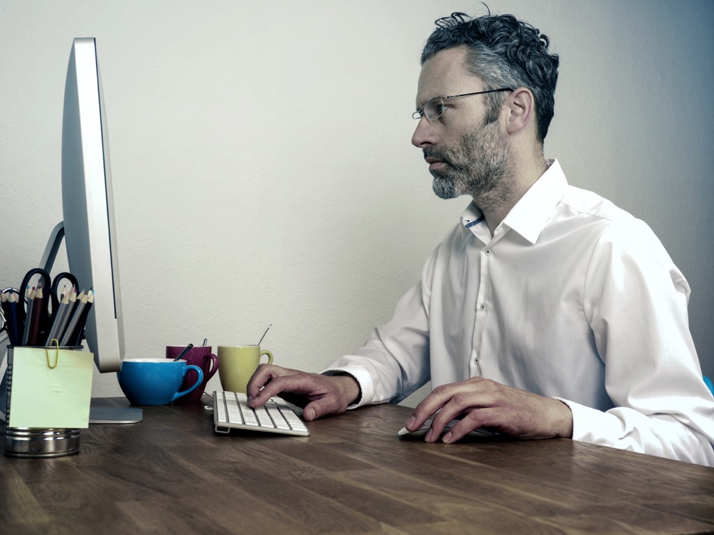man checking in with deadlines Organized