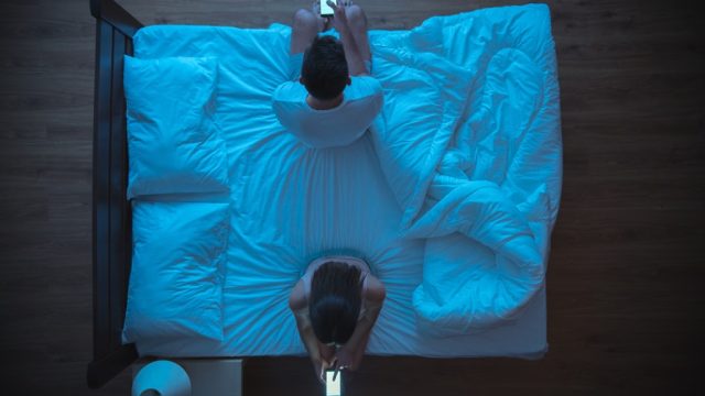 Couple who can't sleep in a Sleepless City.