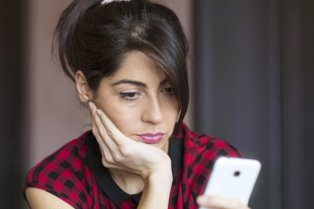 bored woman texting