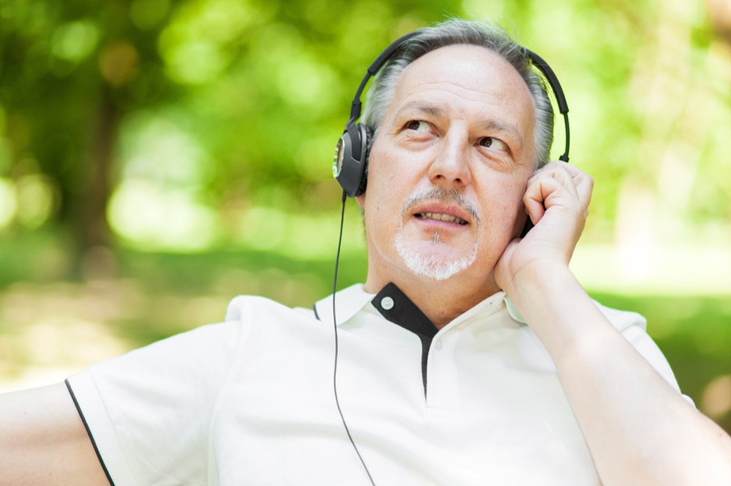 man listening to demonstrate riddle