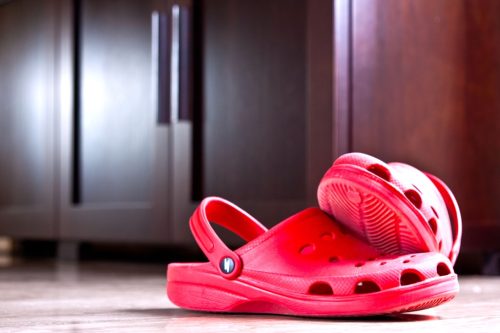 Red crocs on floor