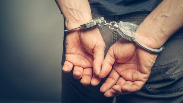 man's hands behind back in handcuffs, things you should never lie to kids about
