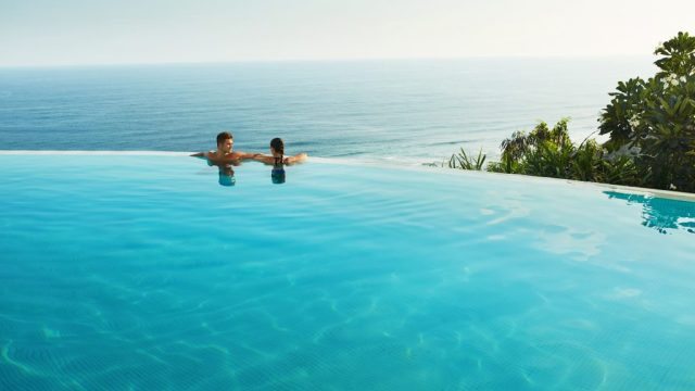 time off couple in pool