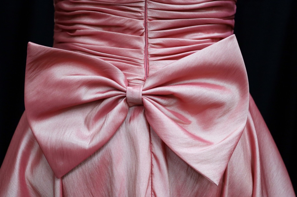 big pink bow on dress - how to dress over 50