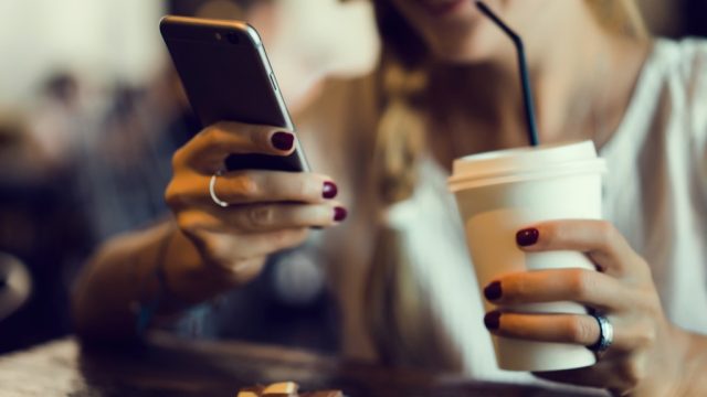 Woman holding smartphoneCrazy Facts You Never Knew About Your Smartphone