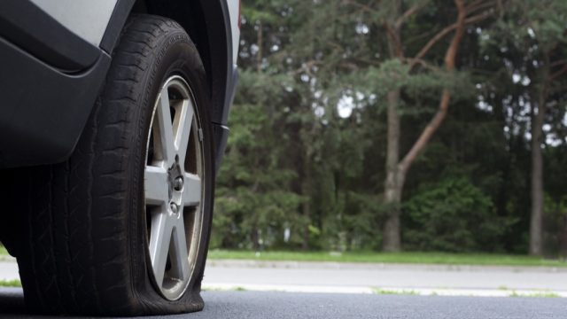 Car with a deflated tire