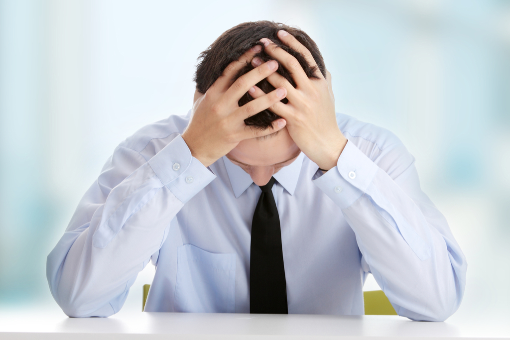 Man with Head in Hands because he doesn't understand the riddle