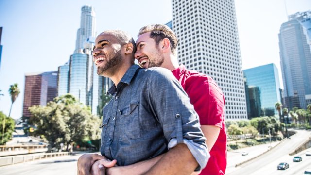 Gay couple enjoying a date in the city outside