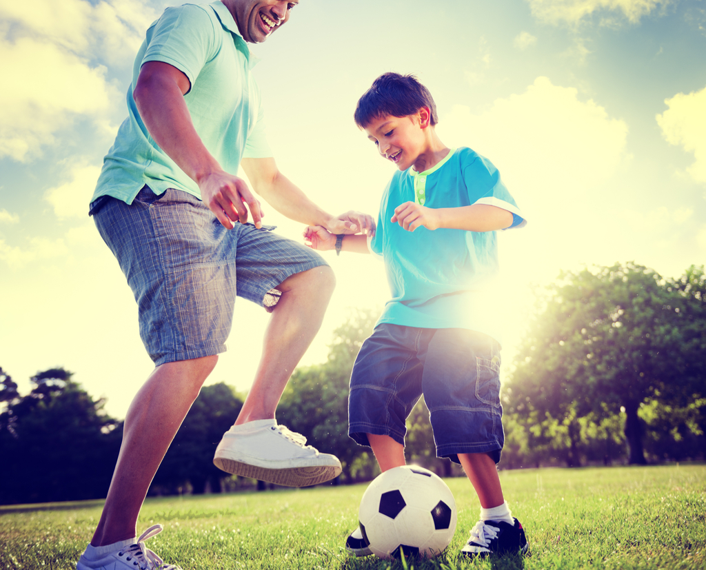 Father and Son Playing Soccer 20 surprising ways fatherhood changes you