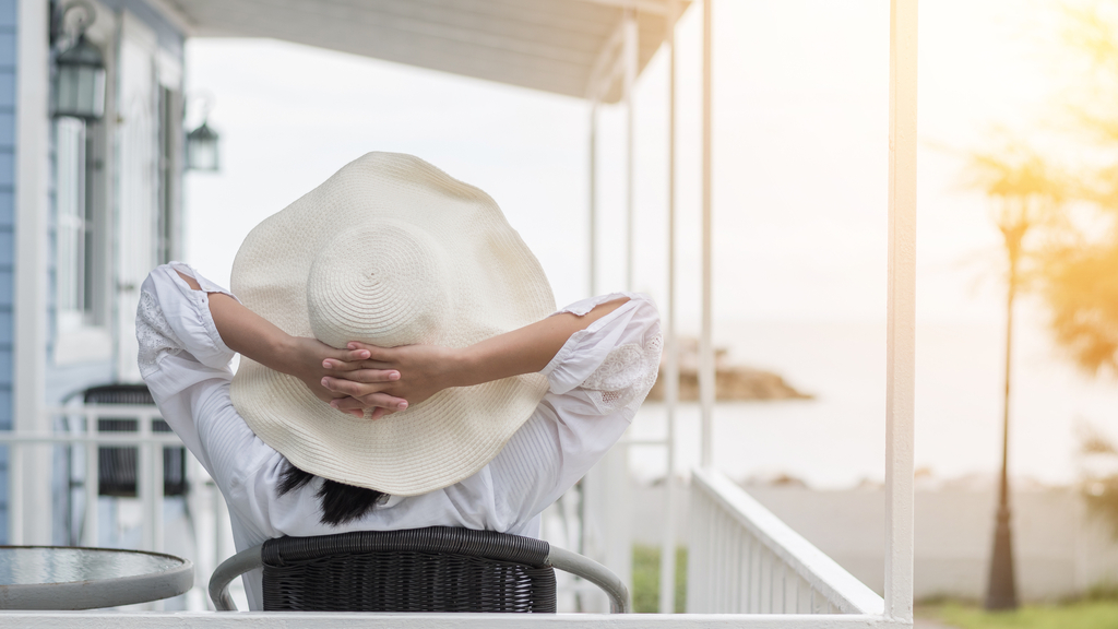 Woman Sitting on Front Porch Simple Pleasures Over-40 People Understand