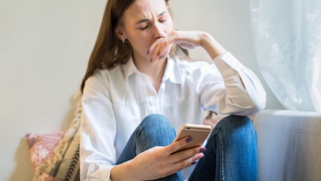 Sad Woman Looking at Phone 25 Years, math jokes