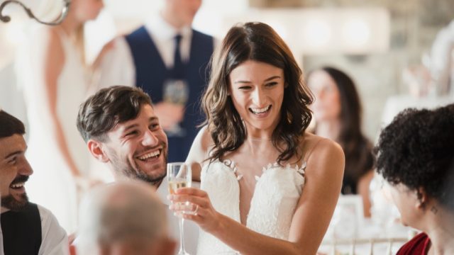 bride and groom hanging out with friends Never do at a Wedding