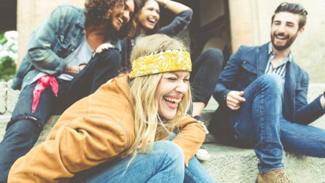 laughing group of friends outside, clean jokes