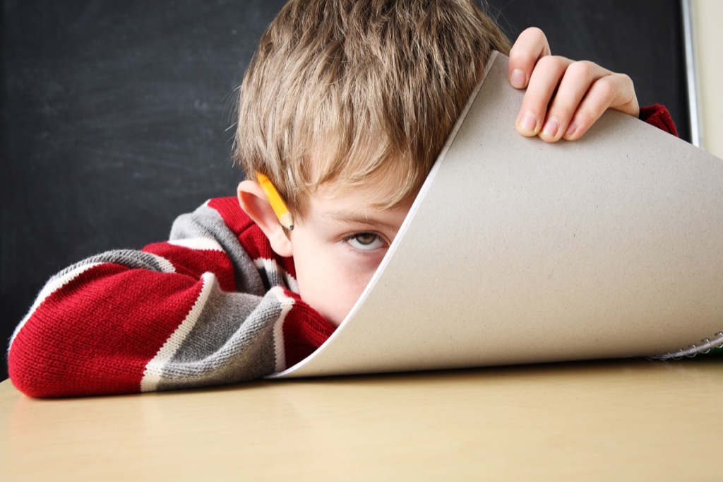 little boy frustrated by riddle