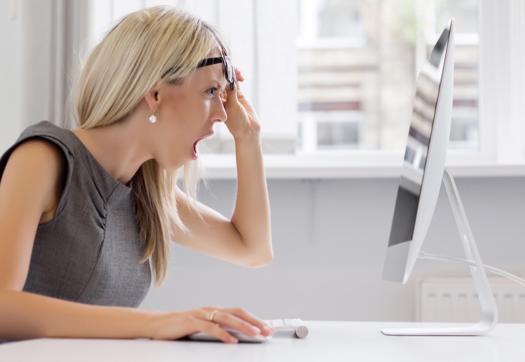 woman shocked on computer