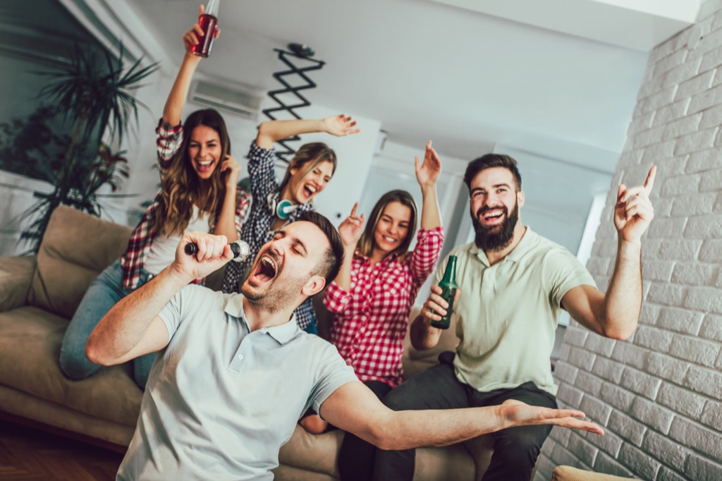 friends singing karaoke