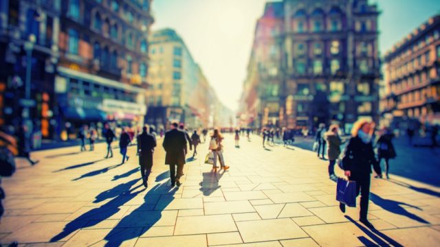 crowd walking in city