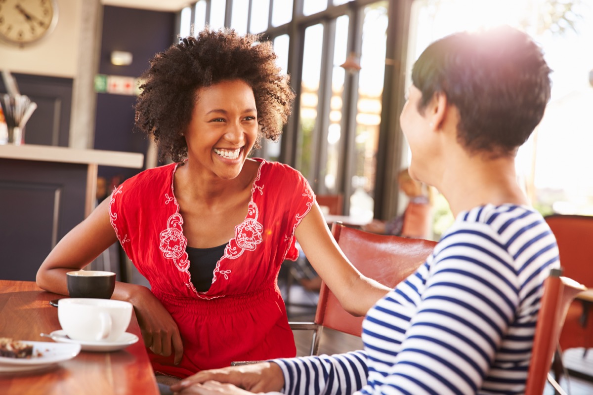 Friends talking and smiling