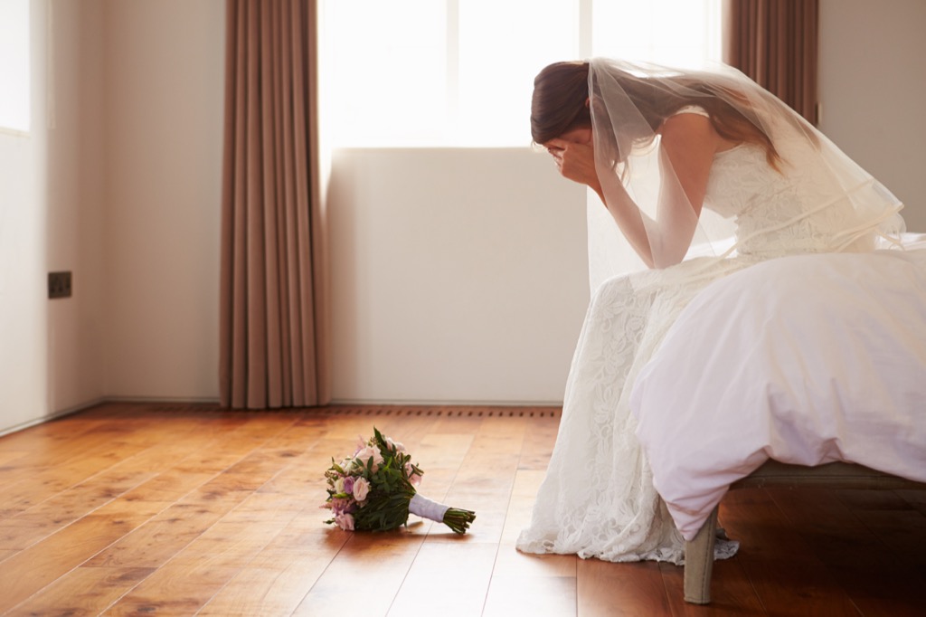 Bride on her wedding day is sad, crying