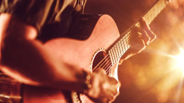 man playing red guitar, math jokes