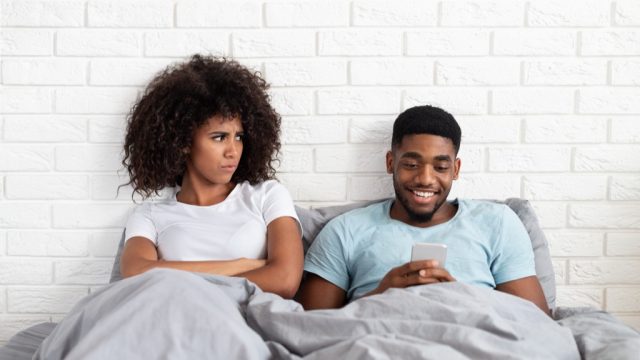 husband texts in bed with wife, annoying things people do