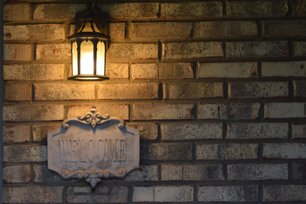 porch light against brick wall