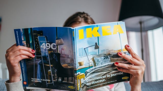 Woman Reading Ikea Catalog Surprising Facts about Ikea