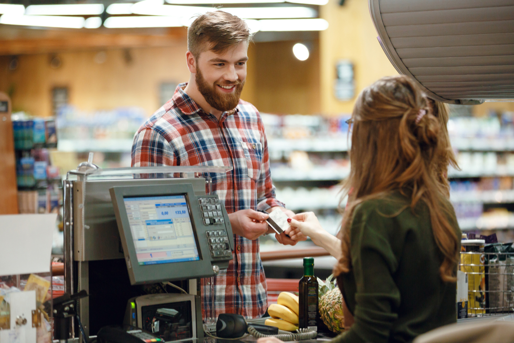 Man Smiling at a Cashier Small Acts of Kindness
