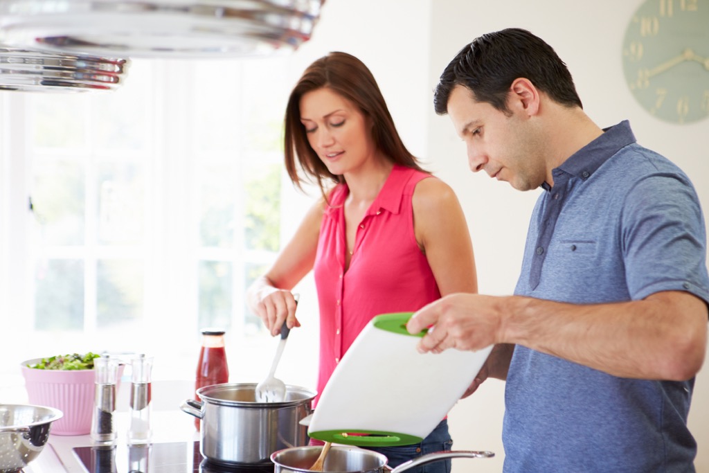 man and woman cooking together, ways to feel amazing