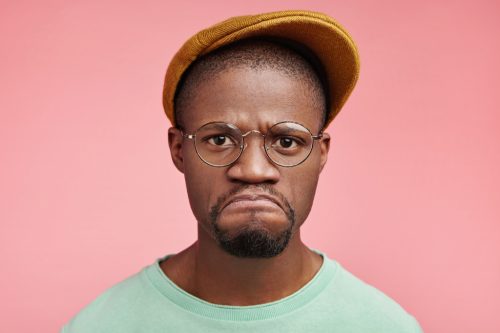 Man Frowning