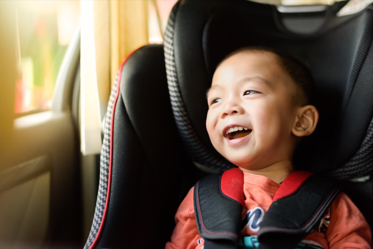 kid in car seat, ways parenting has changed.