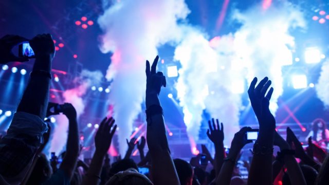 young people attending an edm show