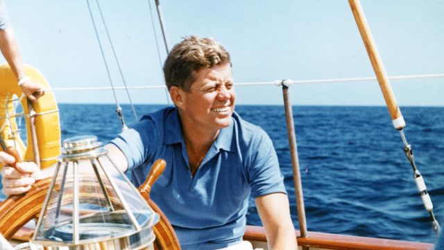 John F. Kennedy on a boat