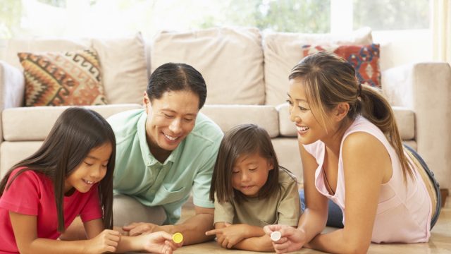Family playing board games
