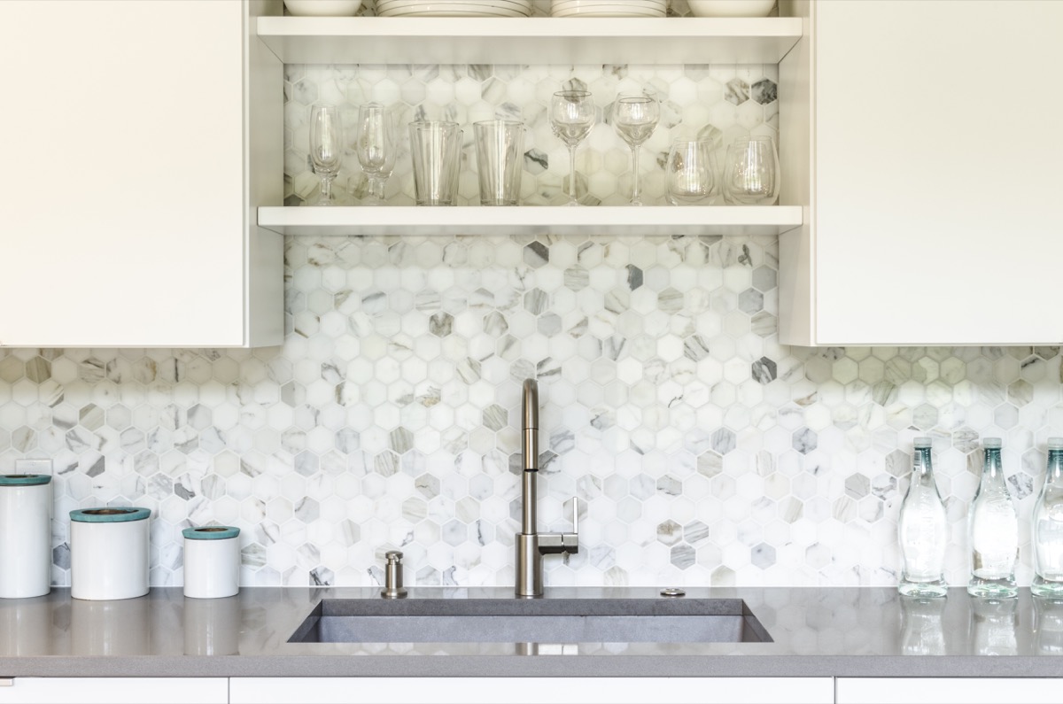 White and gray kitchen with octagonal backsplash