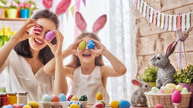 easter mother and daughter holding eggs - best easter games