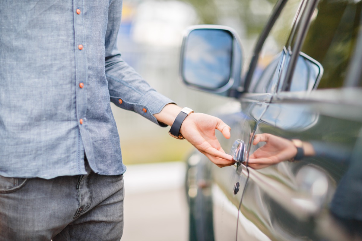 Guy Opening a Car Door