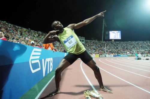 usain bolt doing his signature 'lightning' move