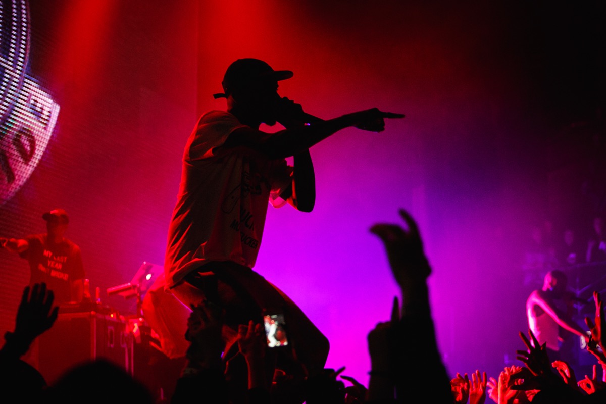 hip hop artist in the dark, representing the music's effect on cheese