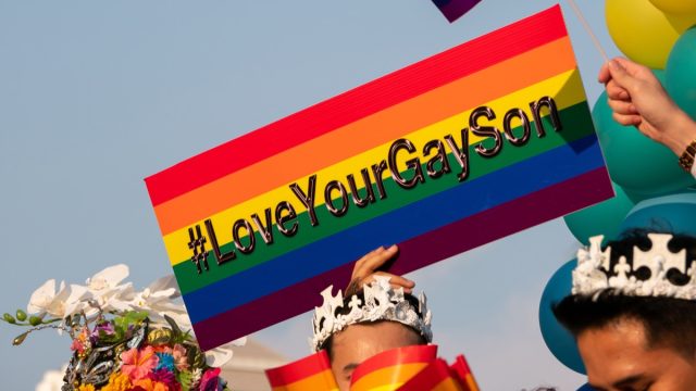love your gay son sign at pattaya pride in thailand photos from pride celebrations