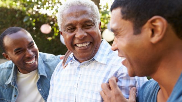 father laughing with his sons, smart person habits