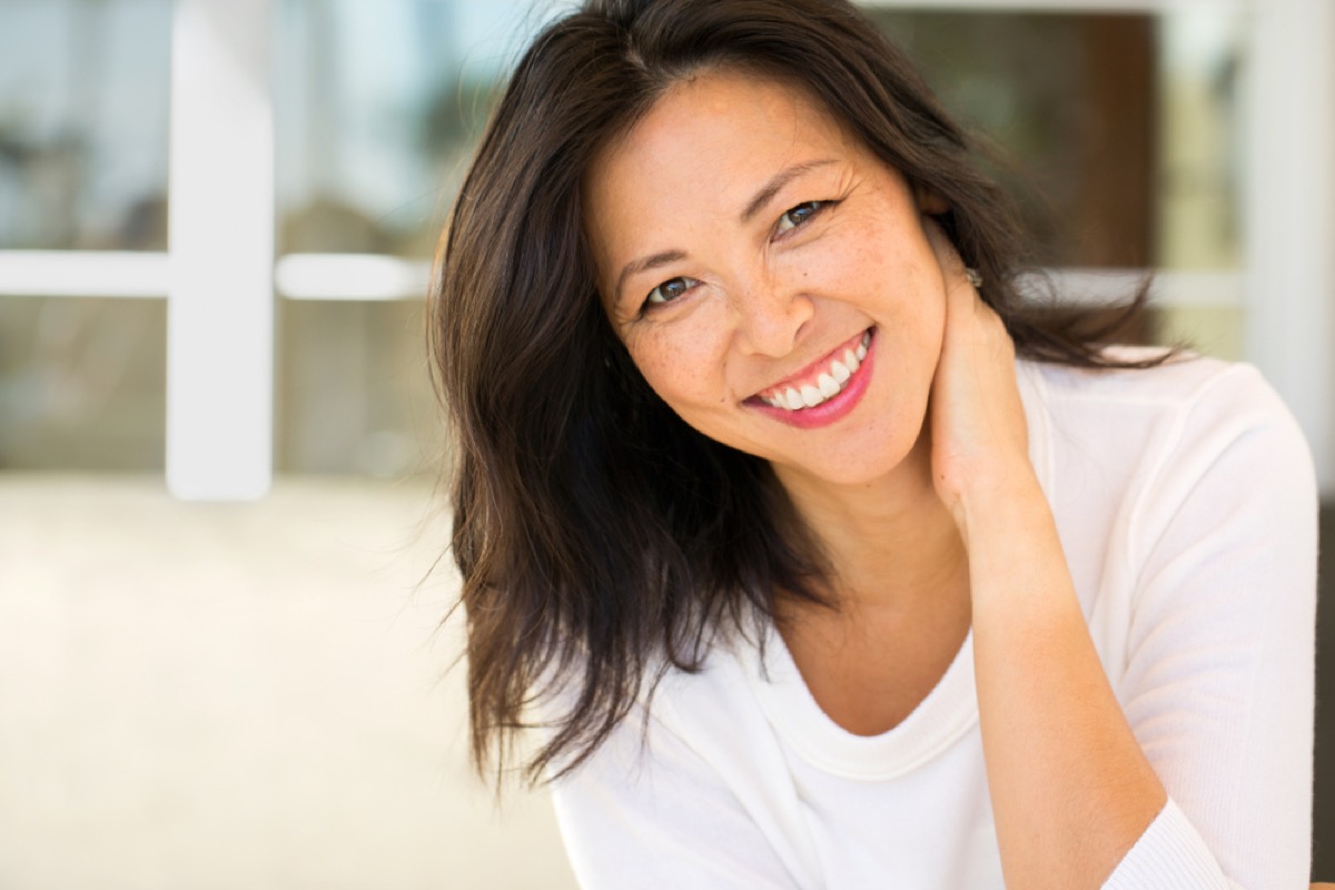 attractive middle aged woman outdoors, look better after 40