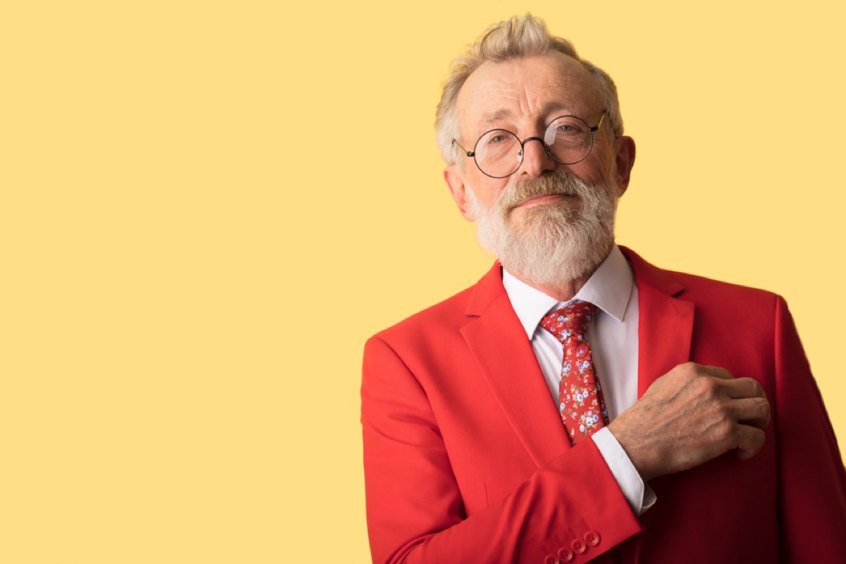 older man wearing red suit, look better after 40