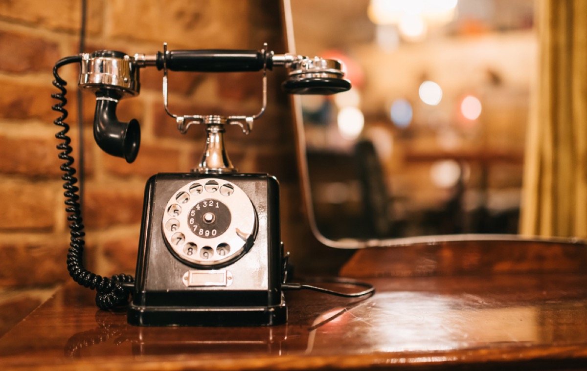 Antique phone on table