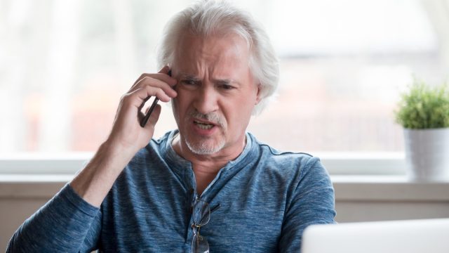 Angry elderly man on phone, things not to say to customer service